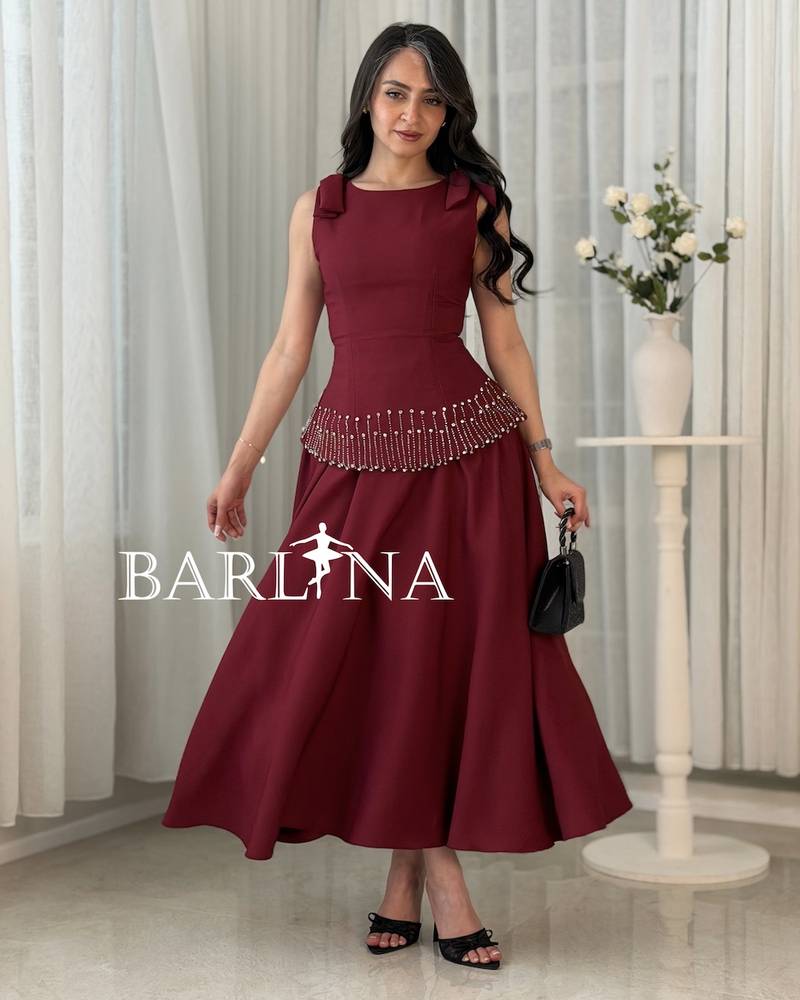 Two-piece burgundy set decorated with rhinestones