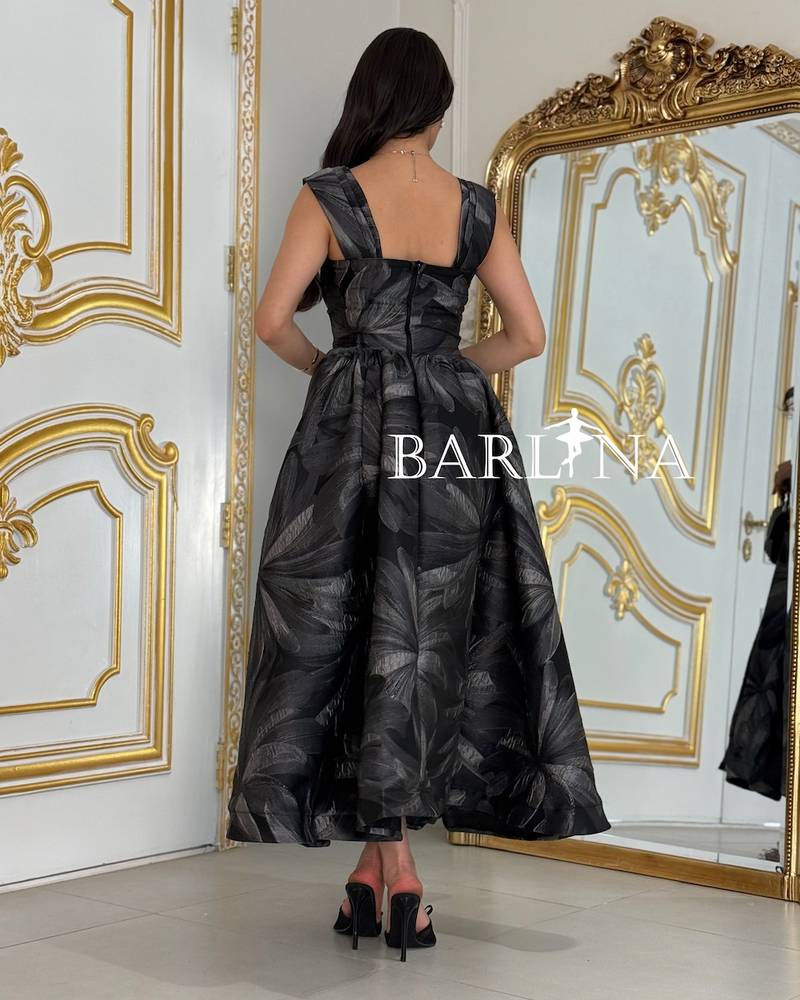 Black dress with a gray jacquard pattern