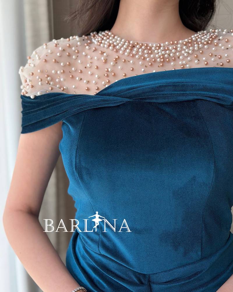 Blue velvet dress with pearl details