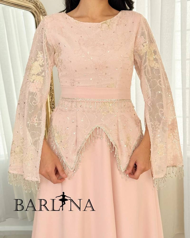 Pink dress with embroidered top and wide sleeves