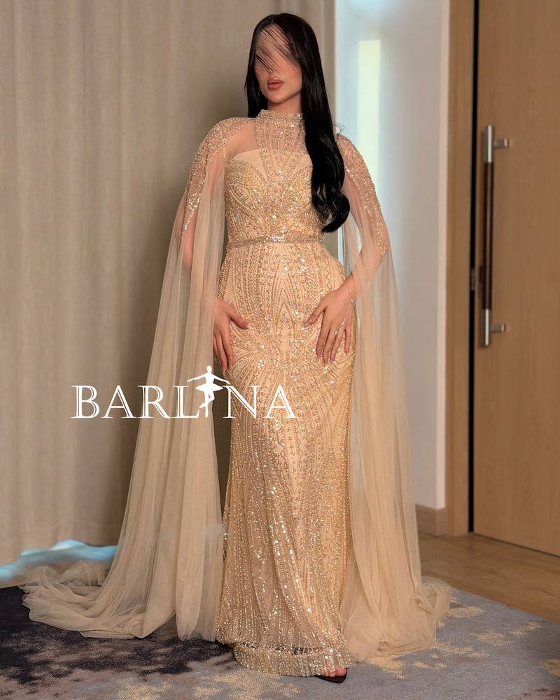 Gold evening dress embroidered with crystals and sequins