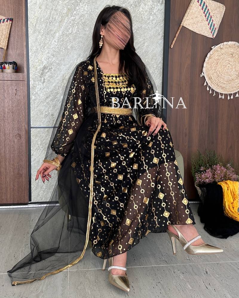 Traditional black jalabiya with sheer abaya