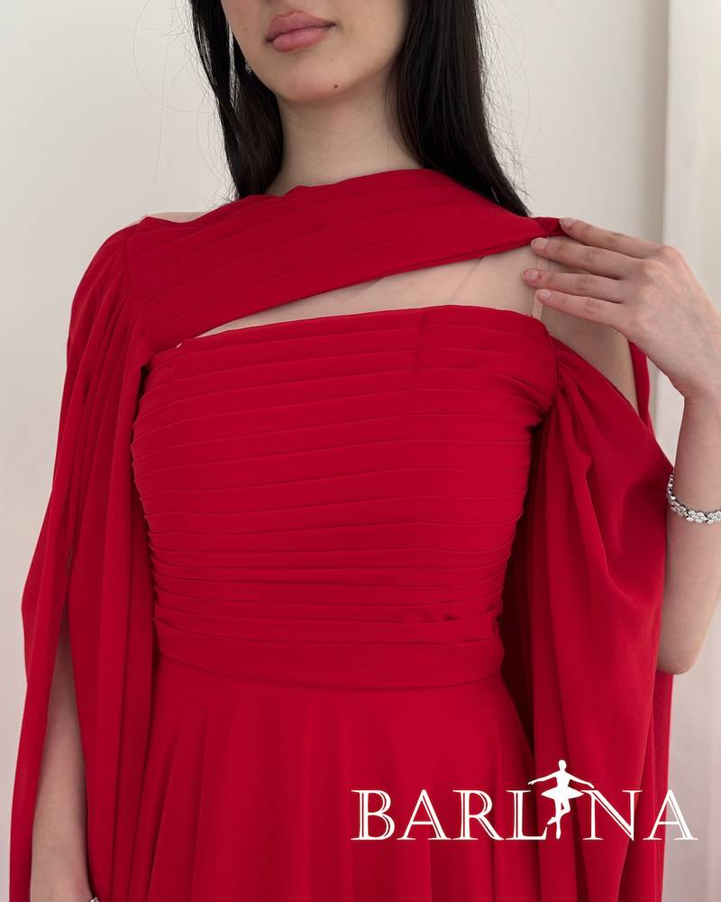 Long red dress with a soft design and a shawl