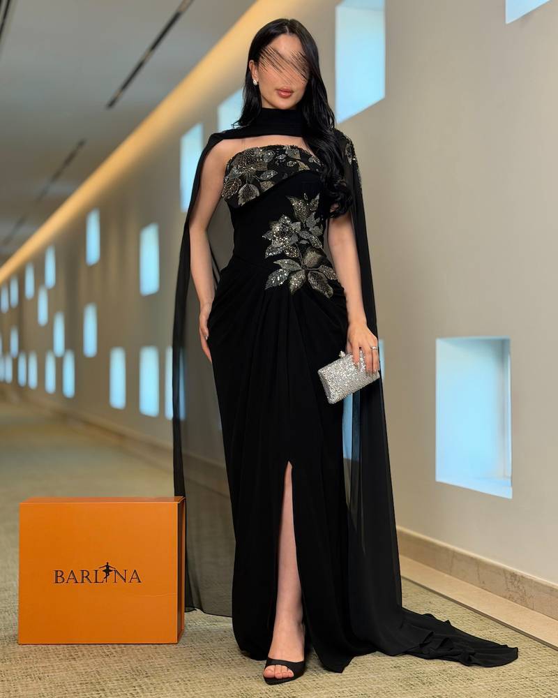 Luxurious black evening dress with sequin embroidery