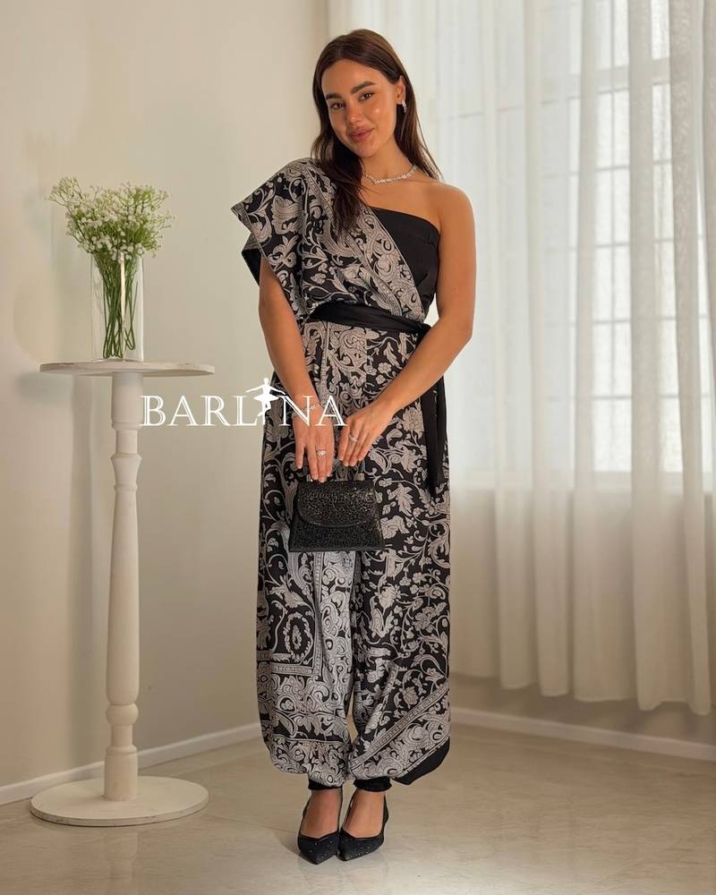 Black floral jumpsuit with one shoulder