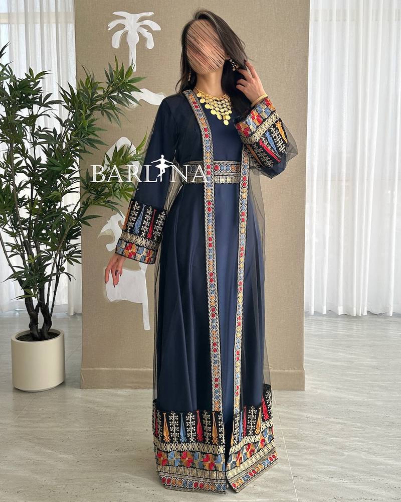 Navy blue jalabiya with colorful traditional embroidery