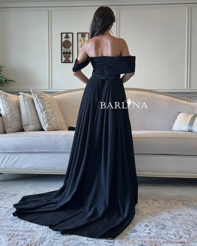 Black off shoulder dress with long tail