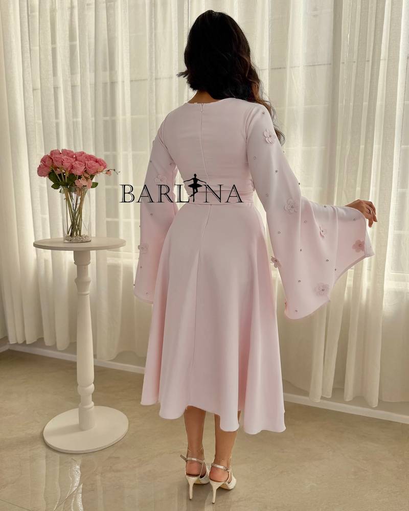 Light pink midi dress with floral sleeves