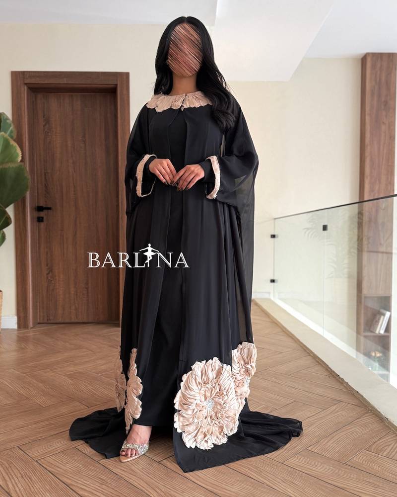 Soft black dress with a floral abaya