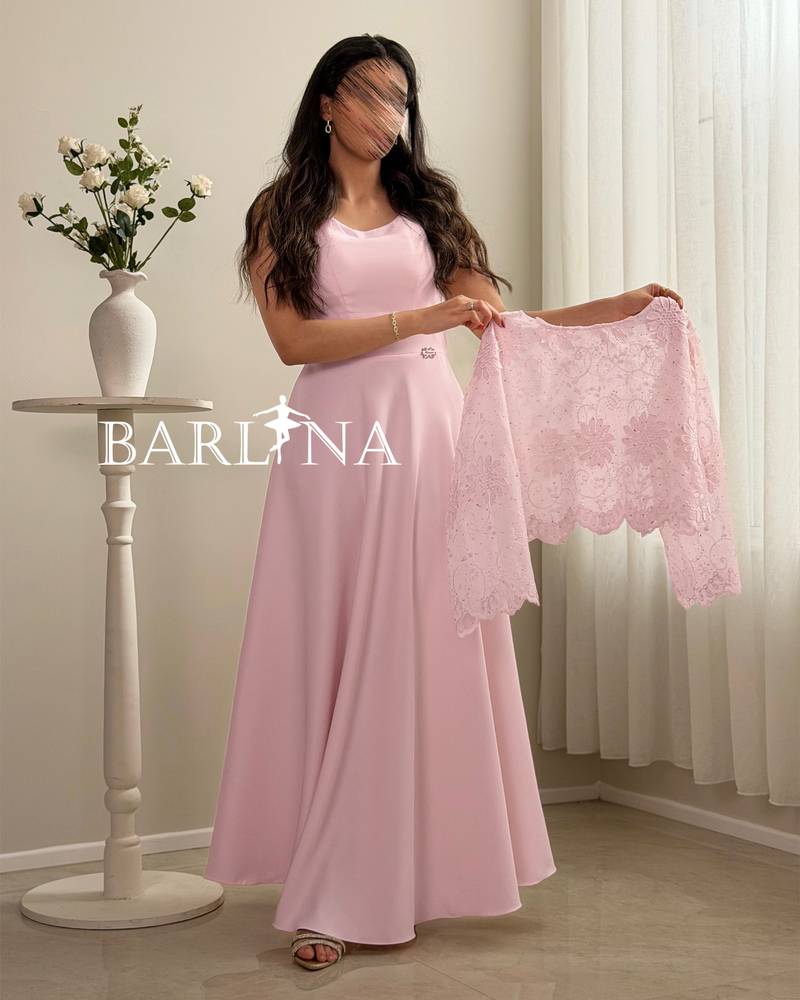 Elegant pink dress with a sheer top