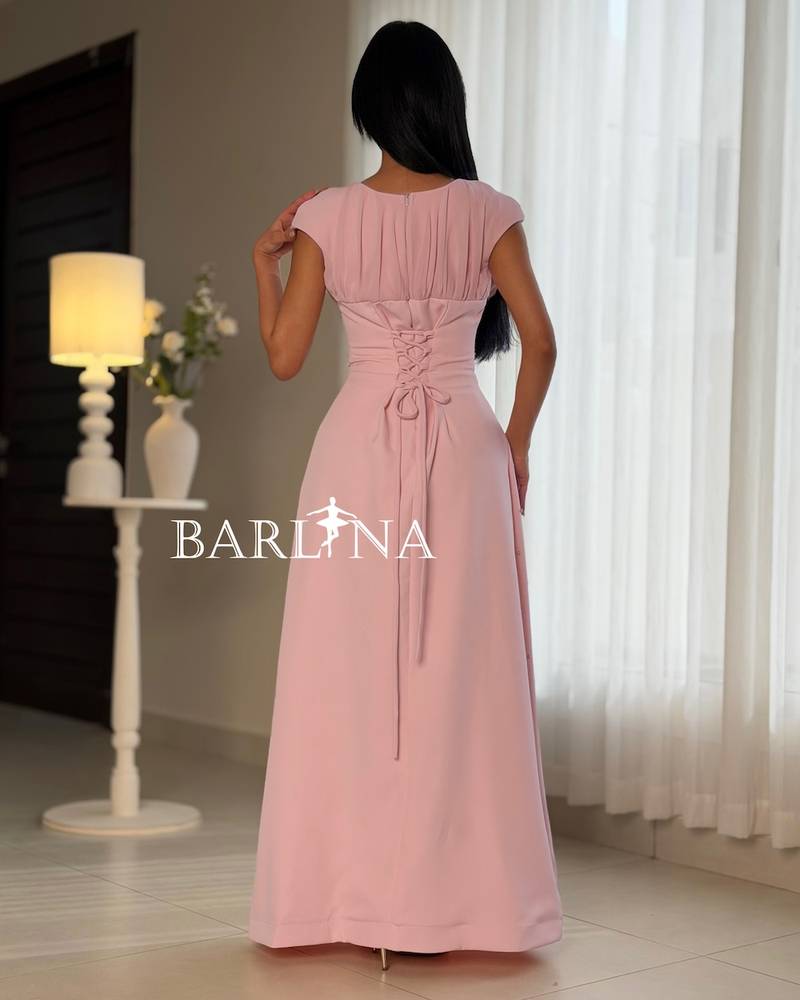 Occasion dress with a fitted waist and scattered crystals