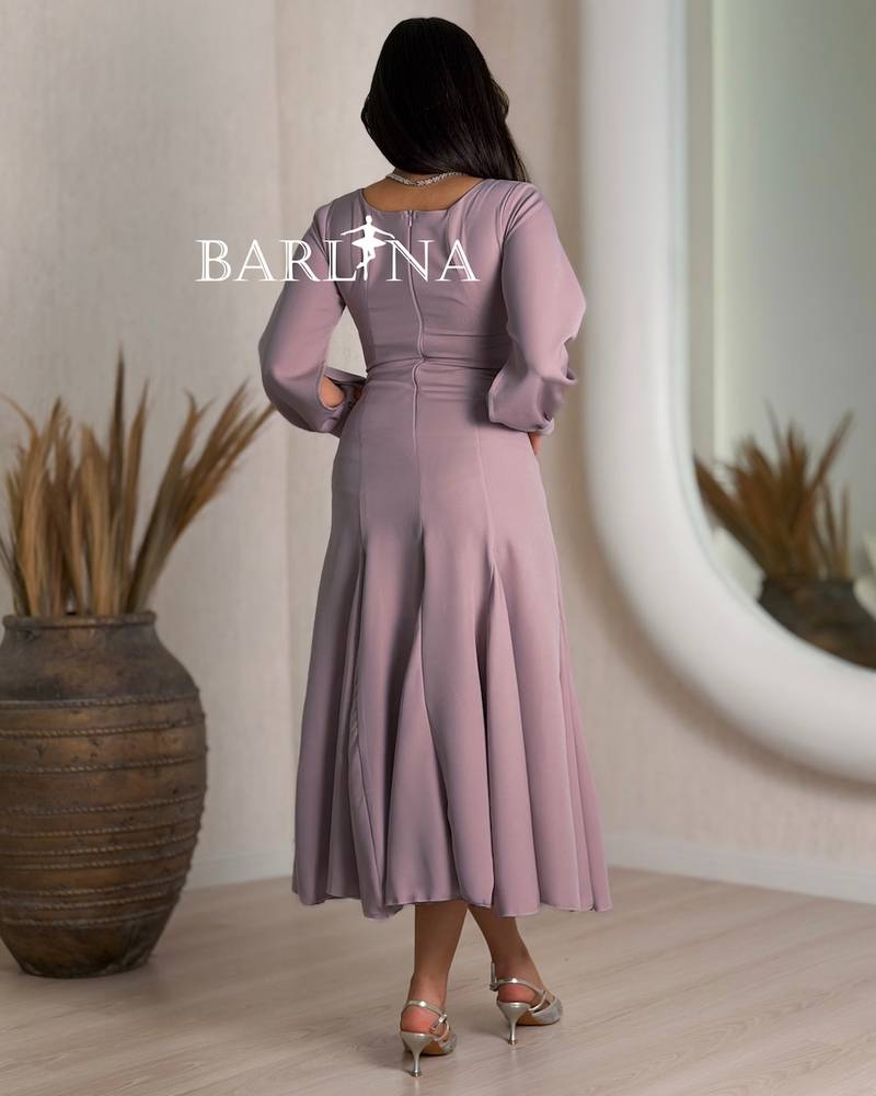 mauve dress with a V-neck and wide pleats