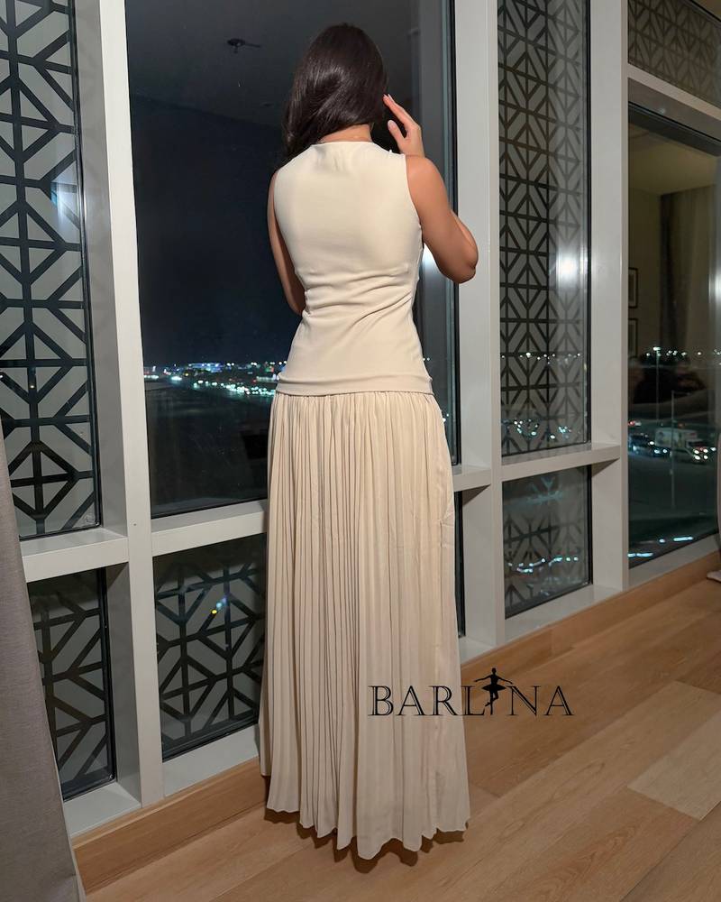 Soft beige long dress with pleated details