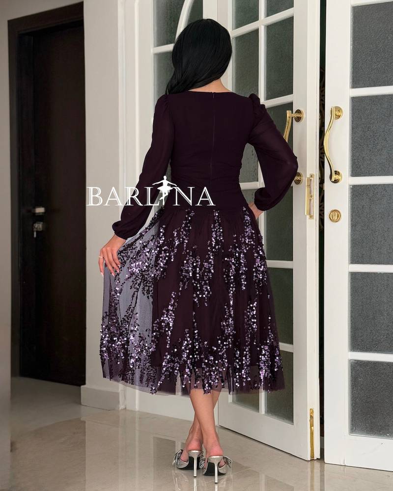 Dark purple midi dress with a touch of soft sequins