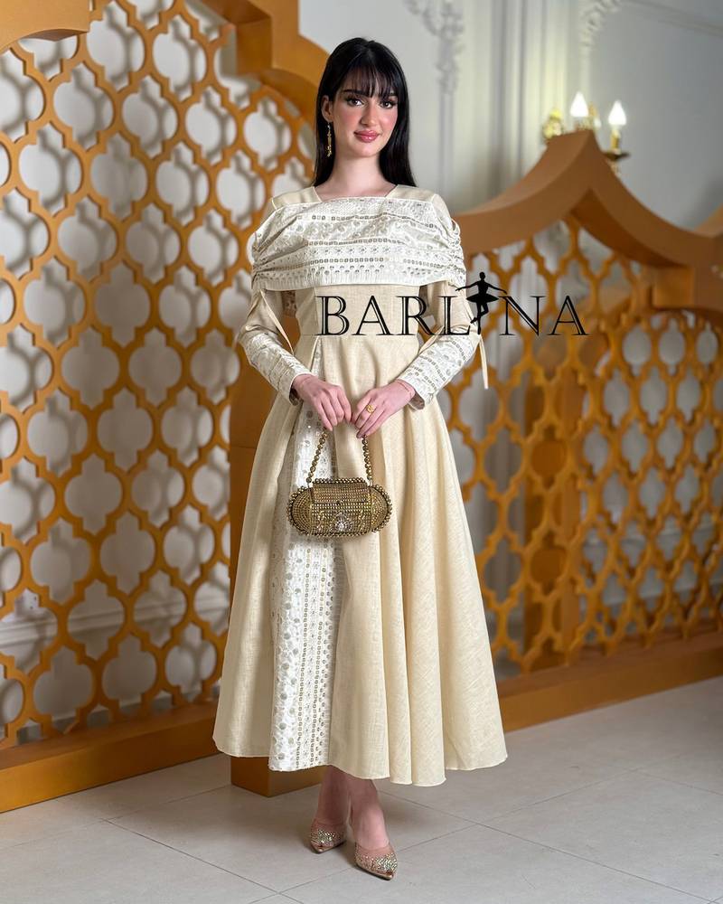 Soft off-white jalabiya with elegant traditional embroidery