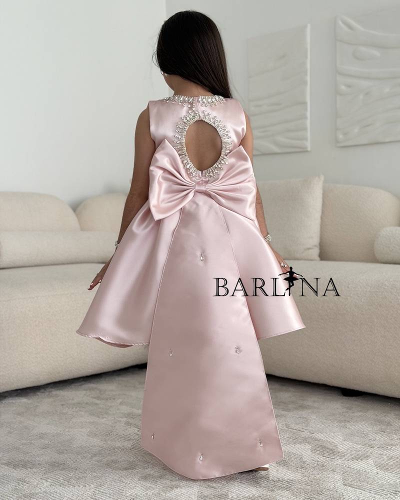 Girls pink dress with bow in the back