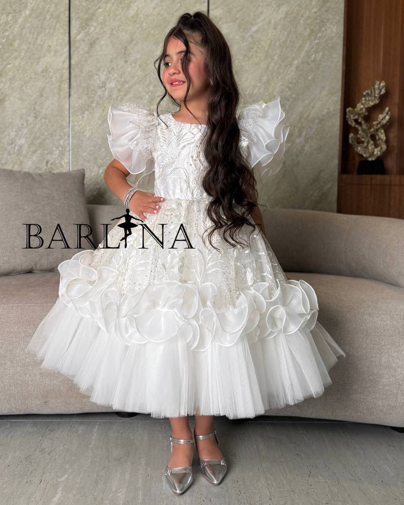 Girls' white dress with layers of soft tulle