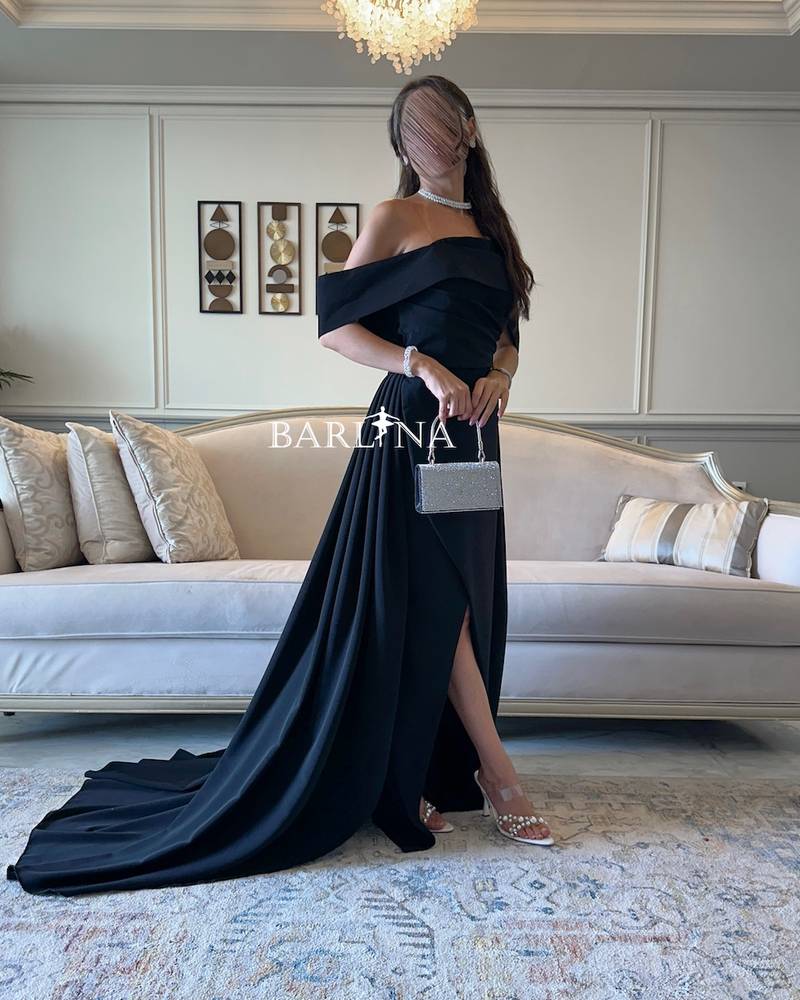 Black off shoulder dress with long tail