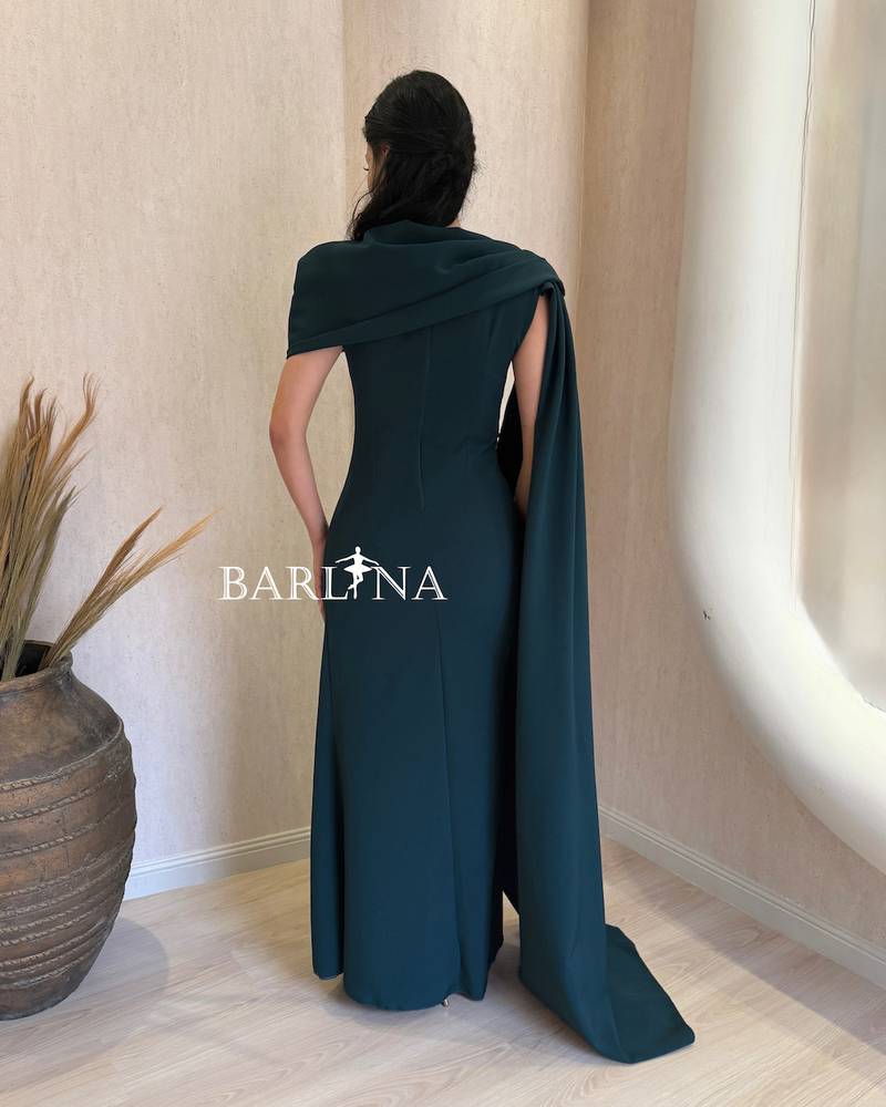 Soft petrol blue dress with draped details