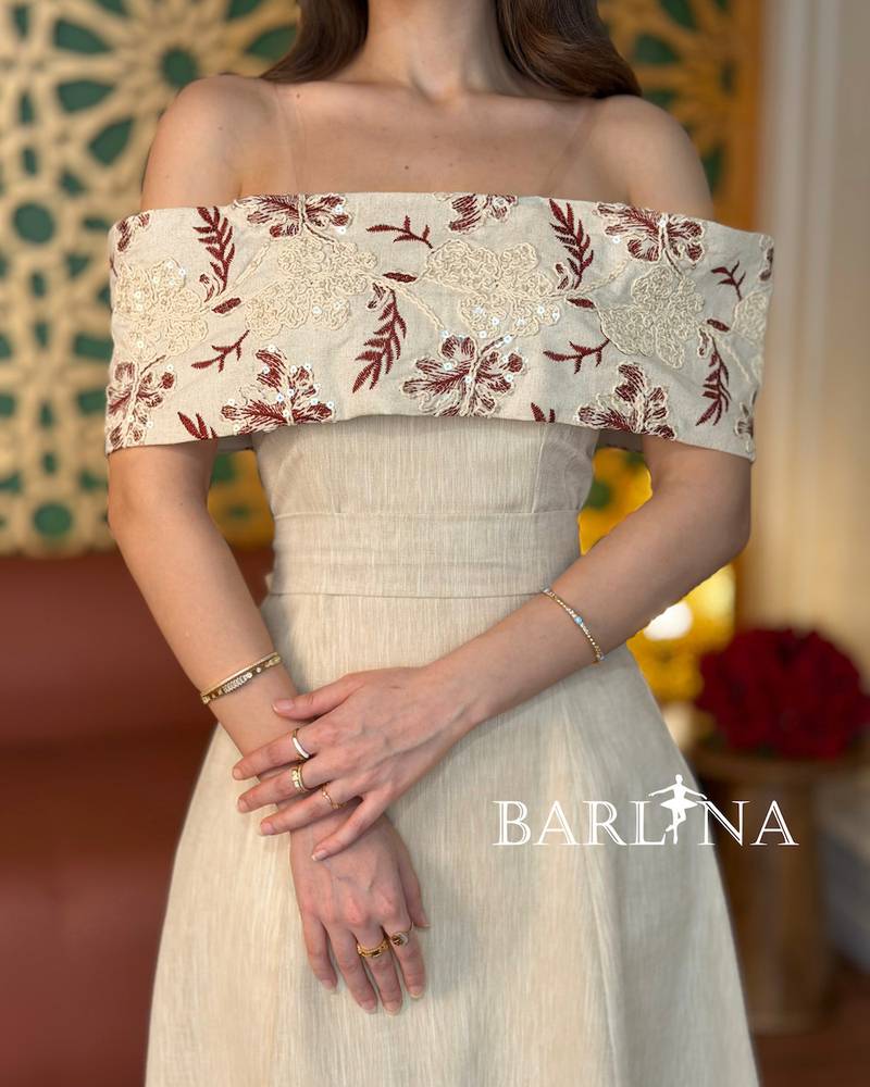 Beige off-shoulder dress with delicate embroidery