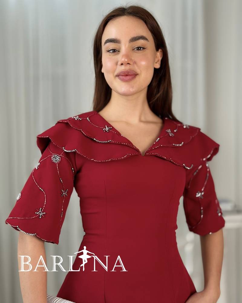 Long red dress with embroidered sleeves