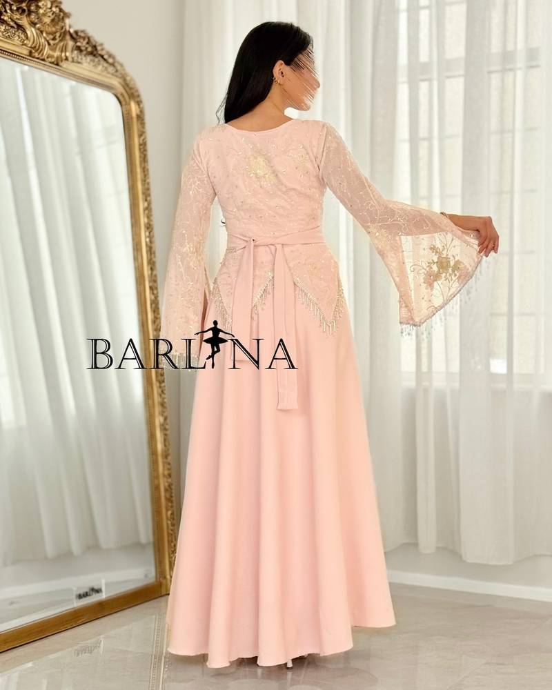 Pink dress with embroidered top and wide sleeves
