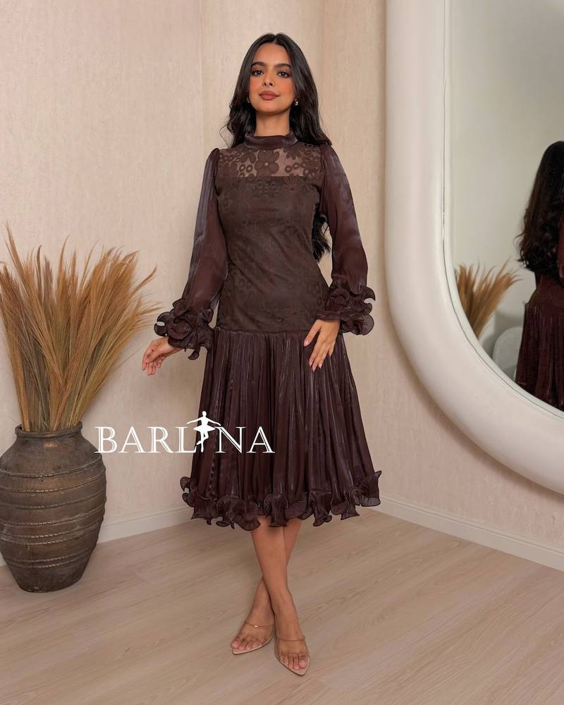 Soft short brown dress with a ruffled hem