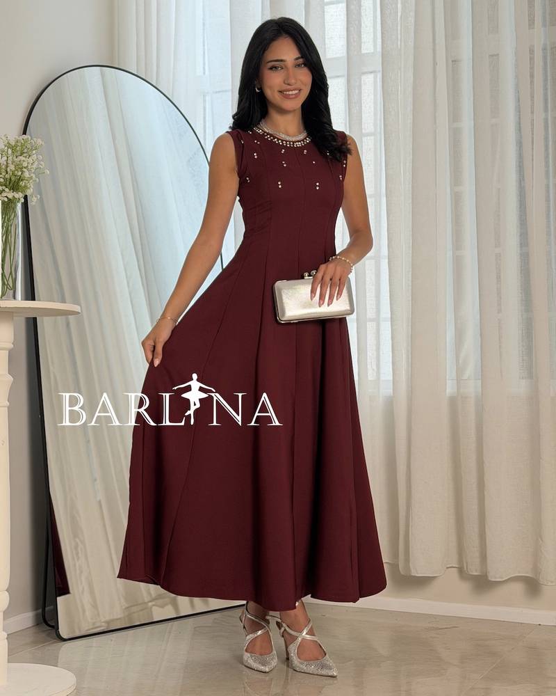 Elegant burgundy dress with a soft flared silhouette