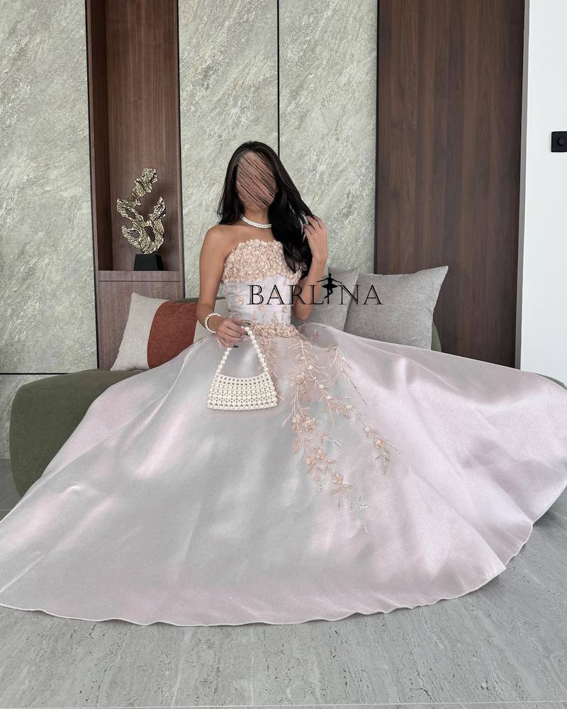 Light pink dress with prominent floral design