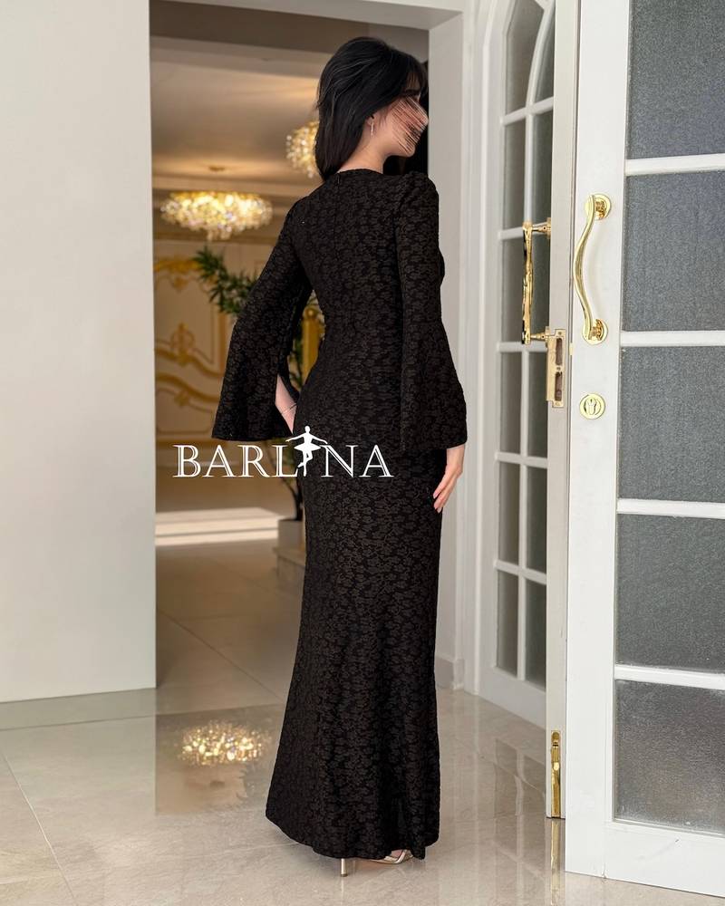 feminine black lace dress with bell sleeves