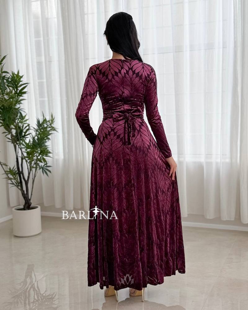 Burgundy dress with one shoulder adorned with crystal beads