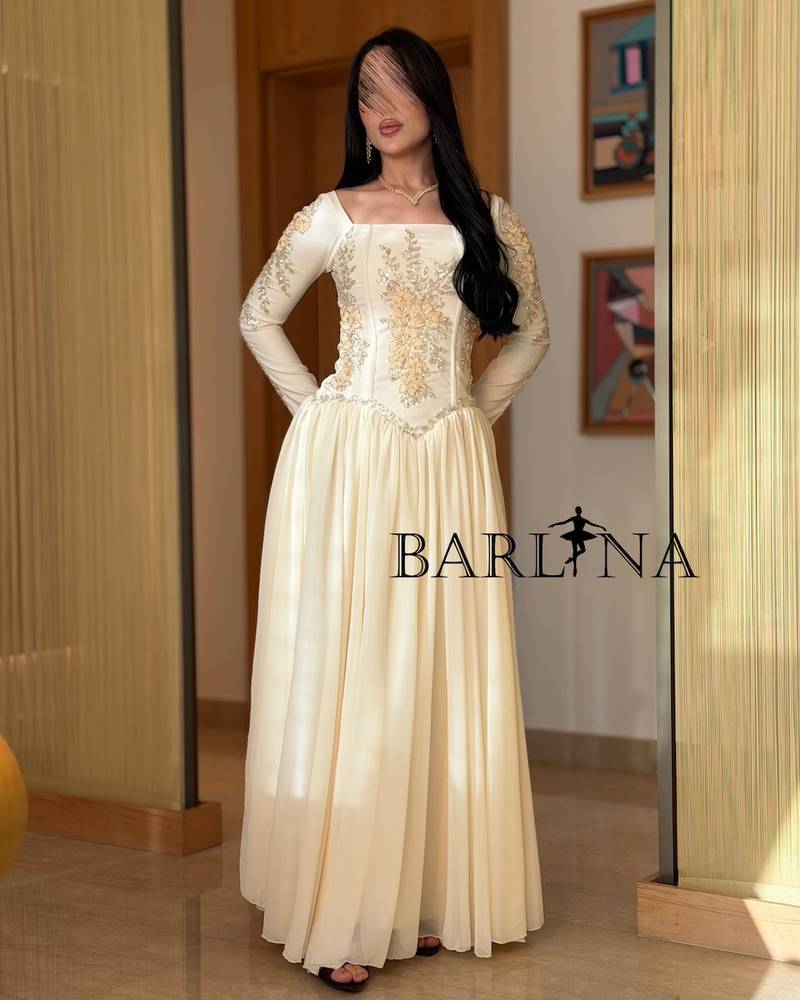 Ivory wide dress with long embroidered sleeves