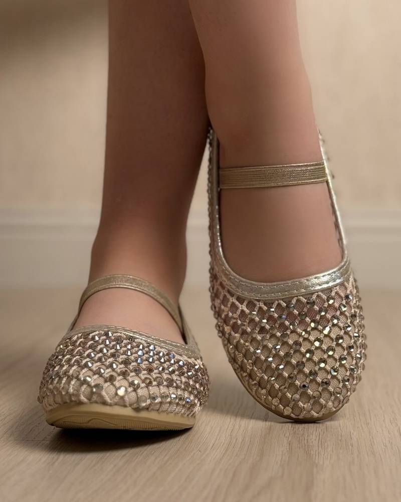 Soft girls' shoes adorned with sparkling crystals