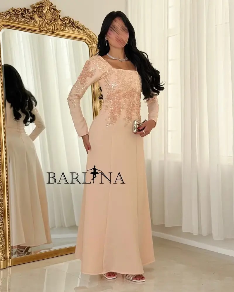 Embroidered melon occasion dress with shimmer details