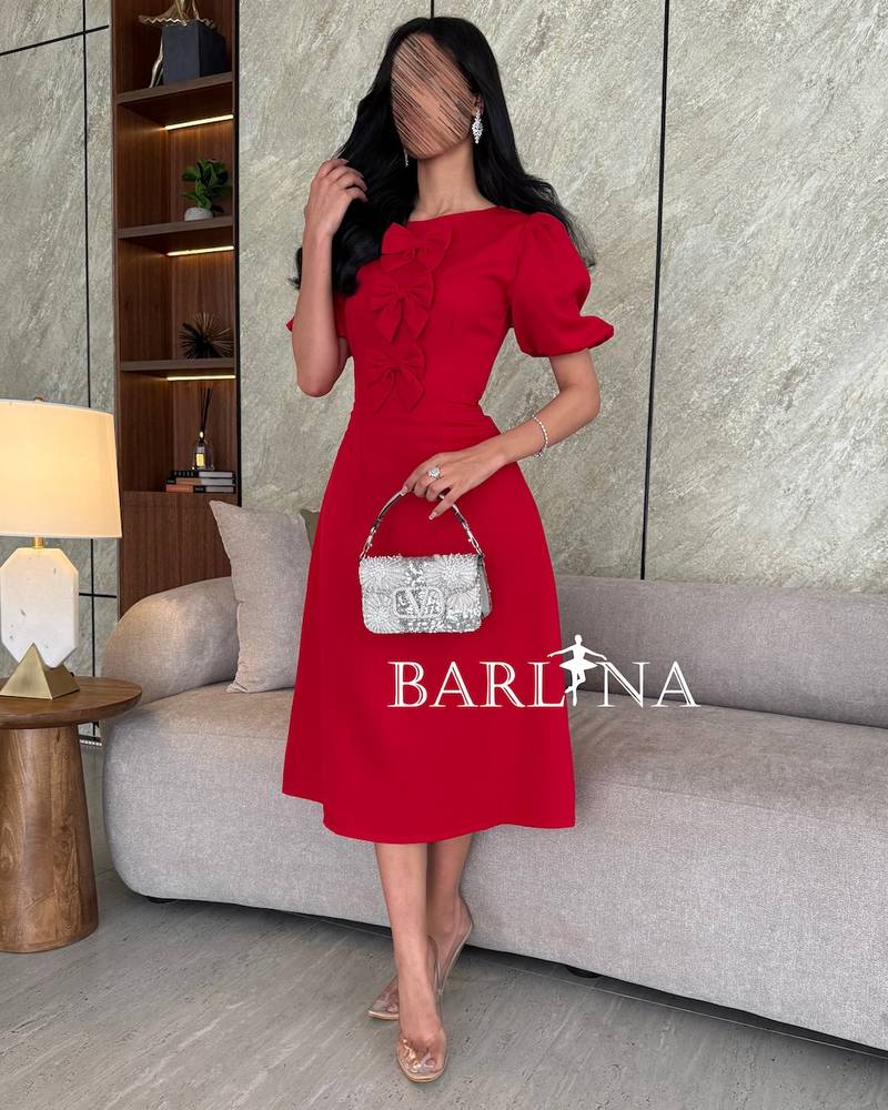 Red midi dress with front bows