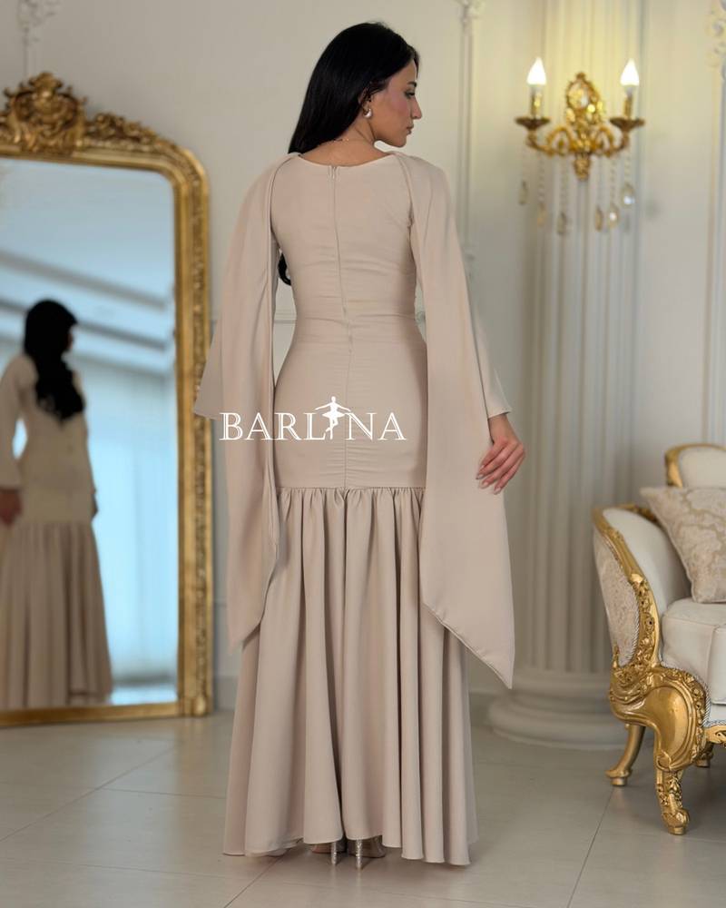 Long beige dress with shimmering details