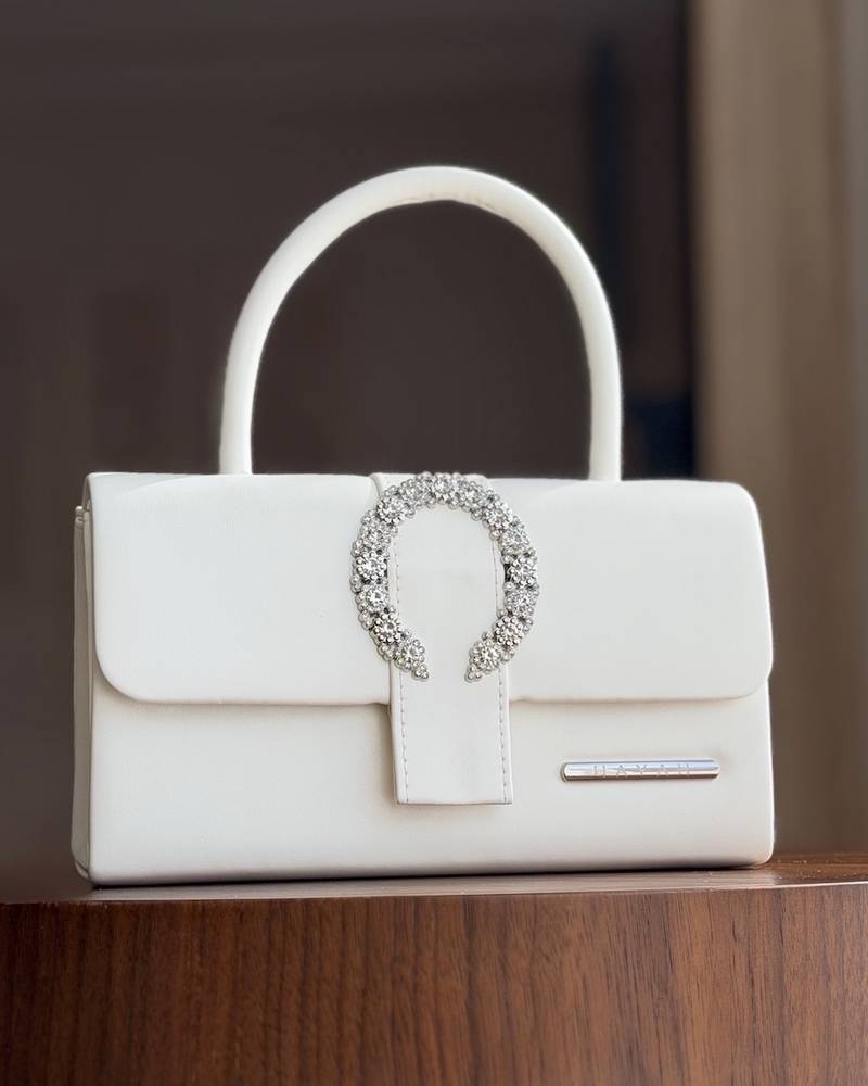 Handbag decorated with crystal details