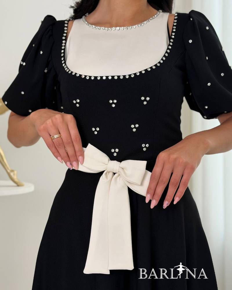 Classic black dress with a crystal waist bow
