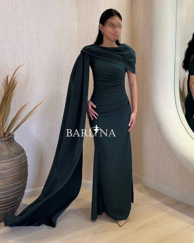 Soft petrol blue dress with draped details