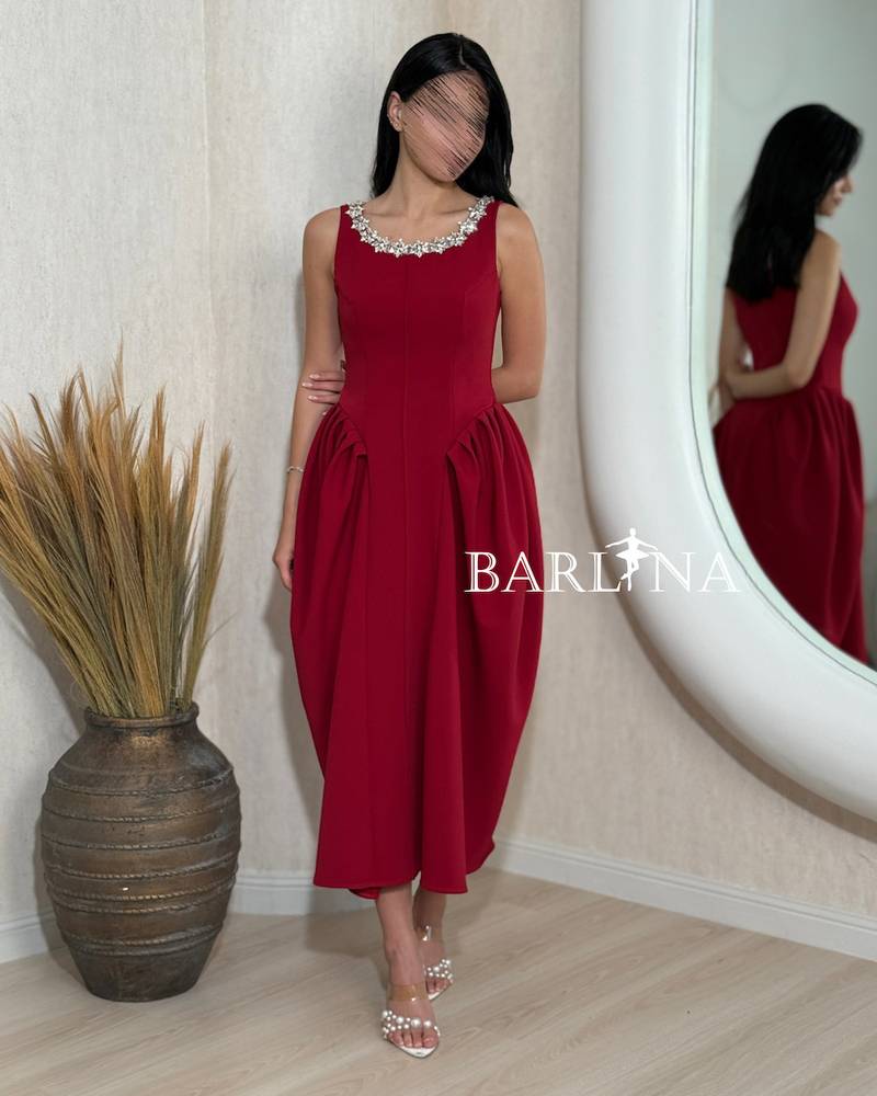 Red sleeveless midi dress with a studded collar