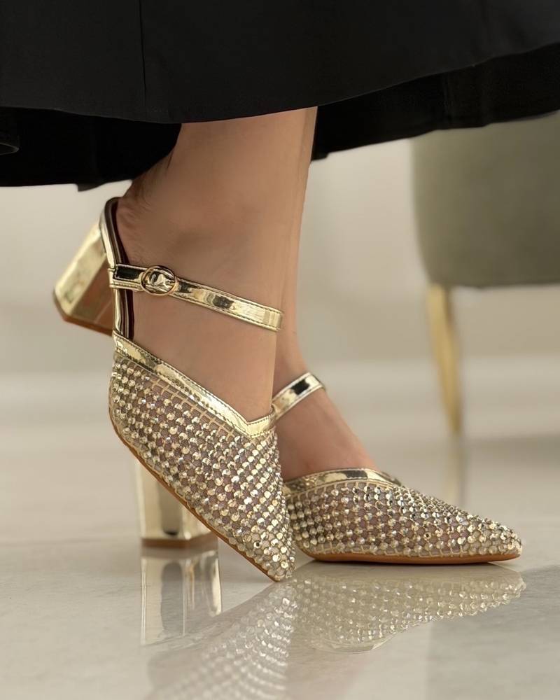 Elegant women's heels fully studded with sparkling gems