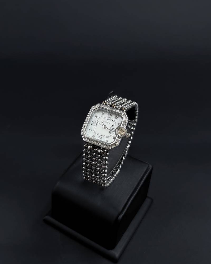 Women's watch with a bezel studded with sparkling beads