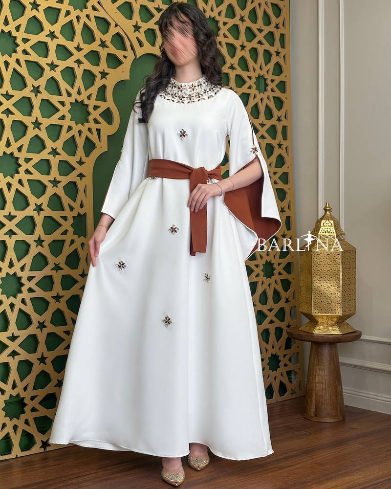 White lined jalabiya decorated with crystals