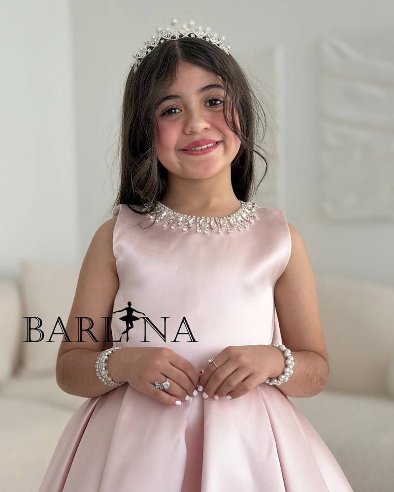 Girls pink dress with bow in the back