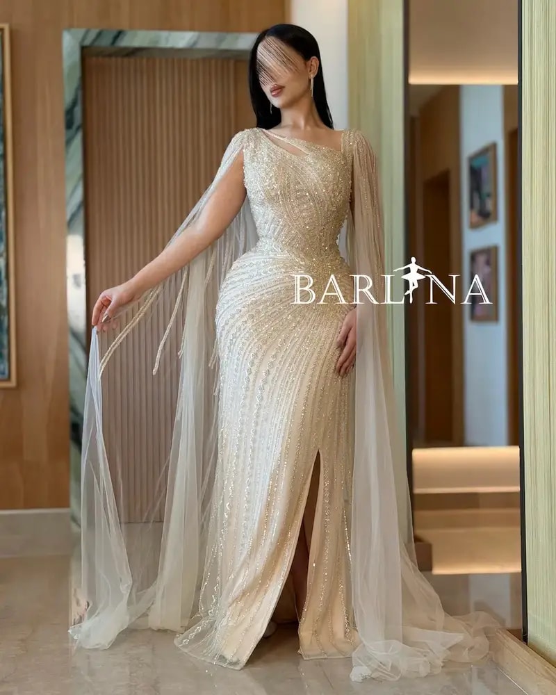 Luxurious off-white evening dress with shimmering embroidery