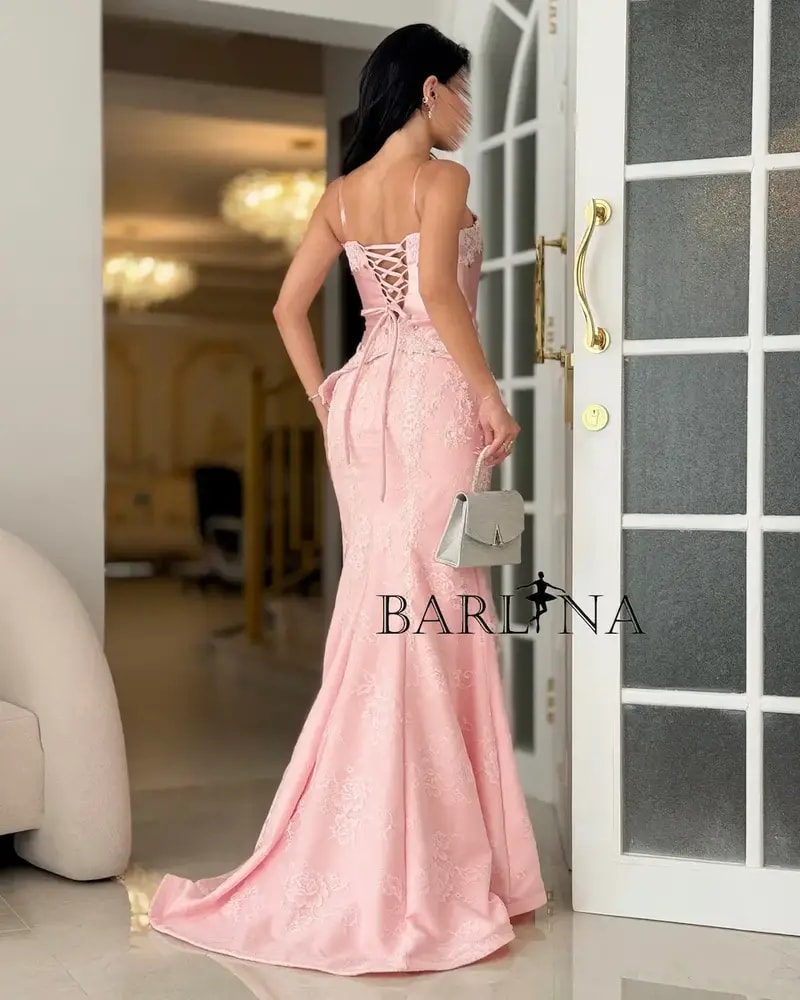 Evening dress with delicate embroidery and a mermaid silhouette