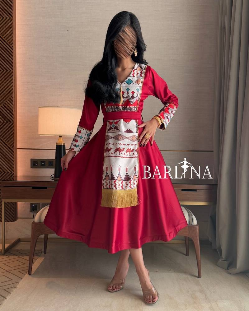 Red midi dress with traditional patterns