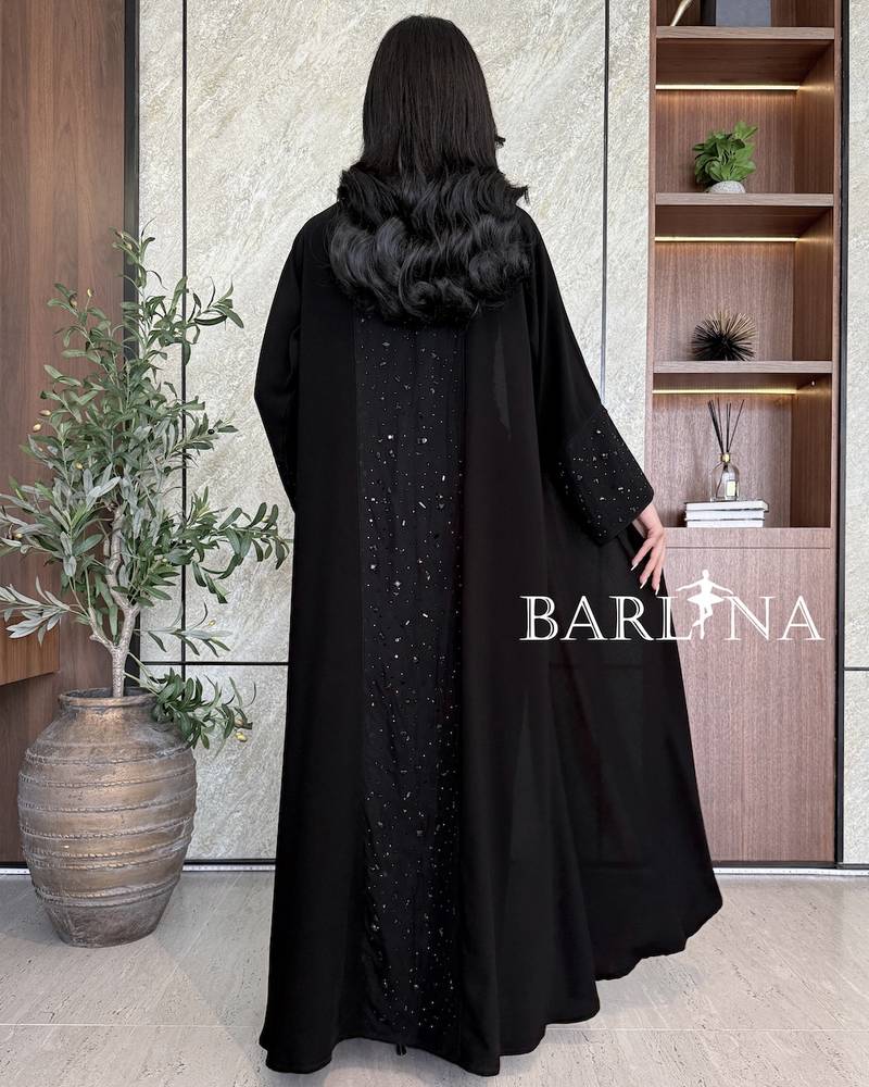 Black abaya with sleeves decorated with crystal accents
