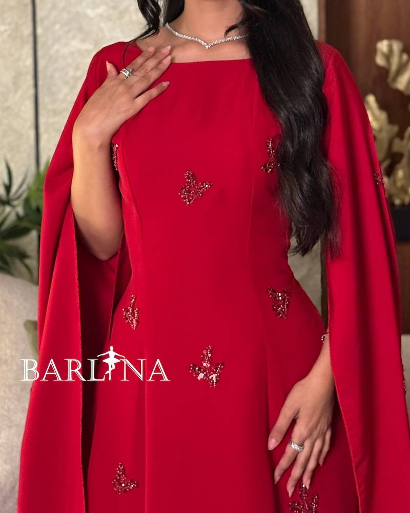 Royal red dress with long draped cape