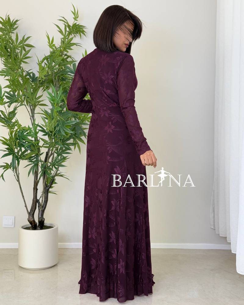A soft purple dress with a subtle patterned fabric